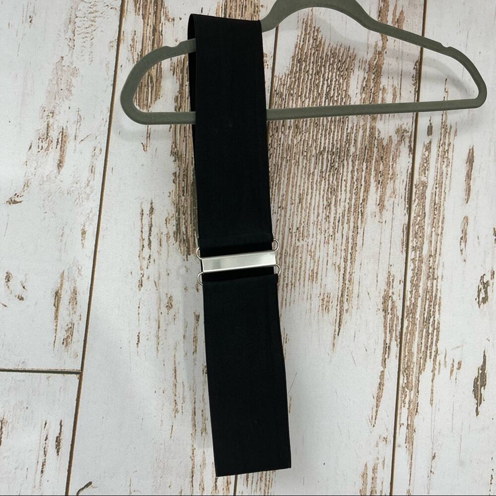 Elastic waist Belt, with metal clasp closure. 35.5” Length 3” Width
